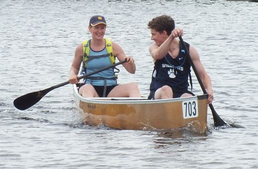 Susan Weiskopf and son Joshua paddling canoe